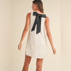 Sleeveless White Sequin Dress with Black Bow at back